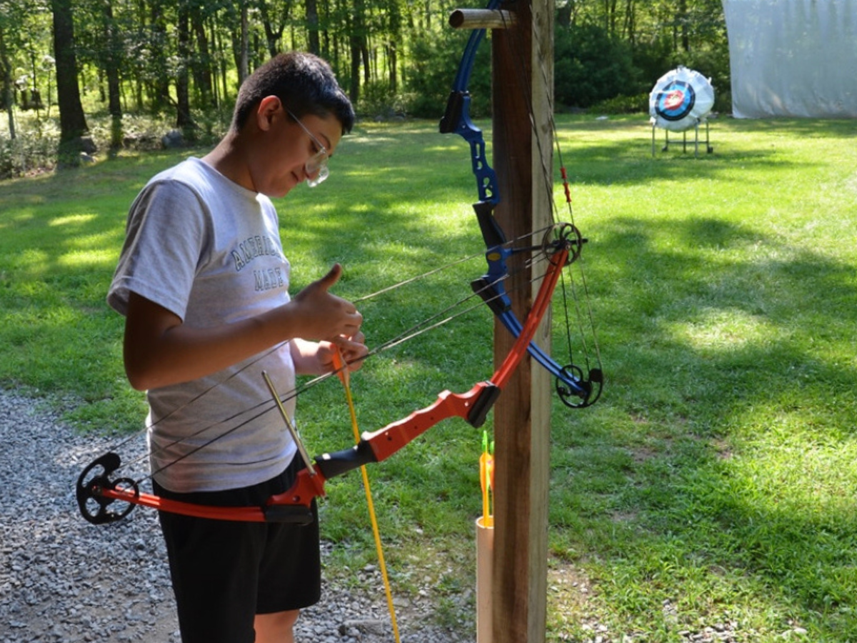 Edwin practices archery